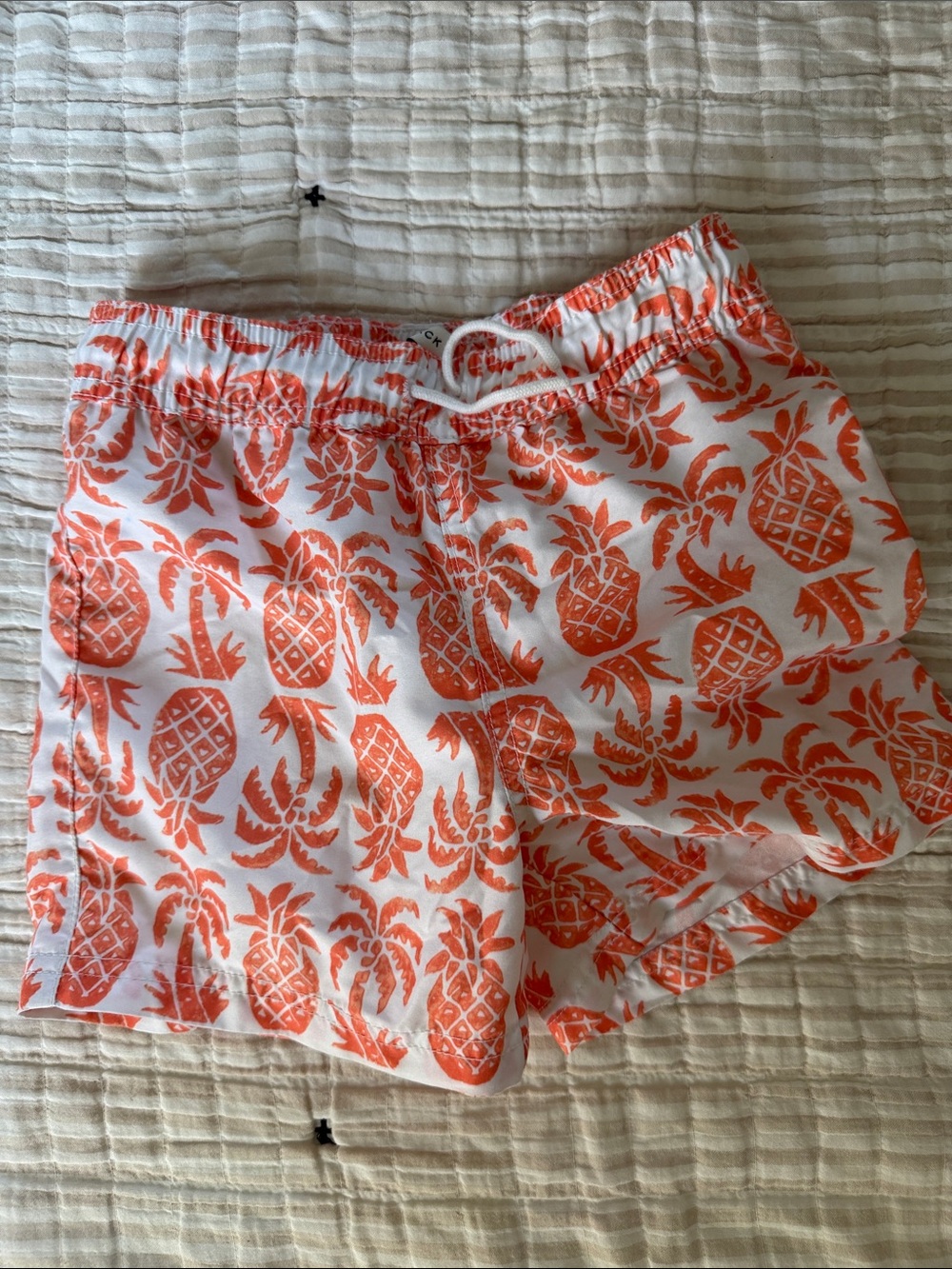Janie and Jack White Swim Shorts with Orange Pineapple Print